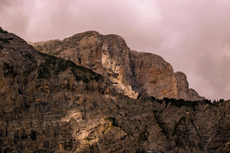 a group of people standing on top of a mountain, by Tobias Stimmer, pexels contest winner, romanticism, pink marble building, rugged face, italy, early evening