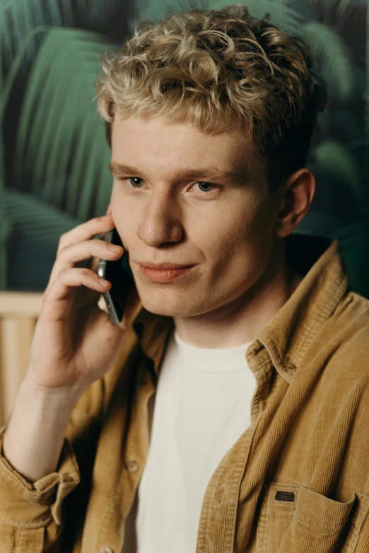 a close up of a person holding a phone