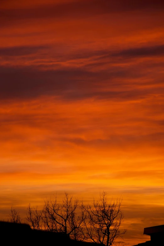 a couple of benches sitting on top of a hill, by Dave Melvin, orange and red sky, minn, some zoomed in shots, sky!!!