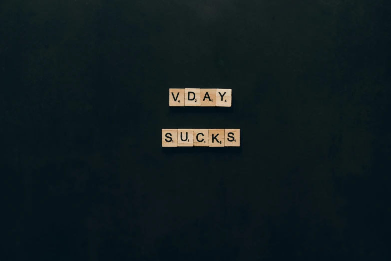 the words today sucks spelled in scrabbles on a black background, an album cover, trending on unsplash, verdadism, venus surface, day, vd, heartbreak