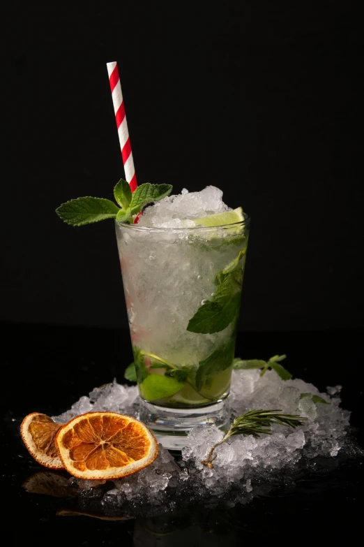 a drink sitting on top of a pile of ice, profile image, herbs, product shot, straw