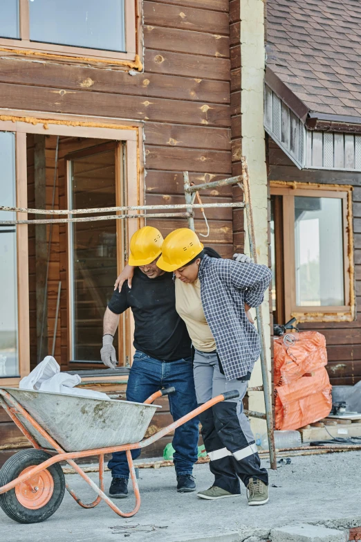 a couple of men standing next to a wheelbarrow, pexels contest winner, renaissance, passive house, scaffolding collapsing, thumbnail, background image