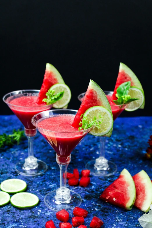 three martini glasses filled with watermelon and lime garnish, a portrait, inspired by Cosmo Alexander, pexels, berry juice, thumbnail, basil gogos, profile image
