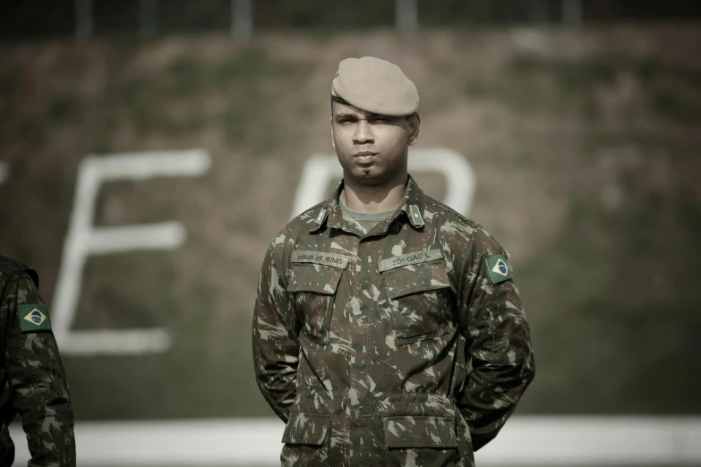 a couple of soldiers standing next to each other, a portrait, by Felipe Seade, professional image, brazilian, male, pfp