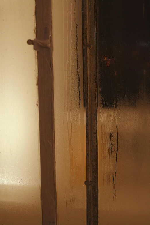 a white toilet sitting inside of a bathroom next to a window, an album cover, lyrical abstraction, smouldering charred timber, 4 k detail, ((rust)), condensation drip