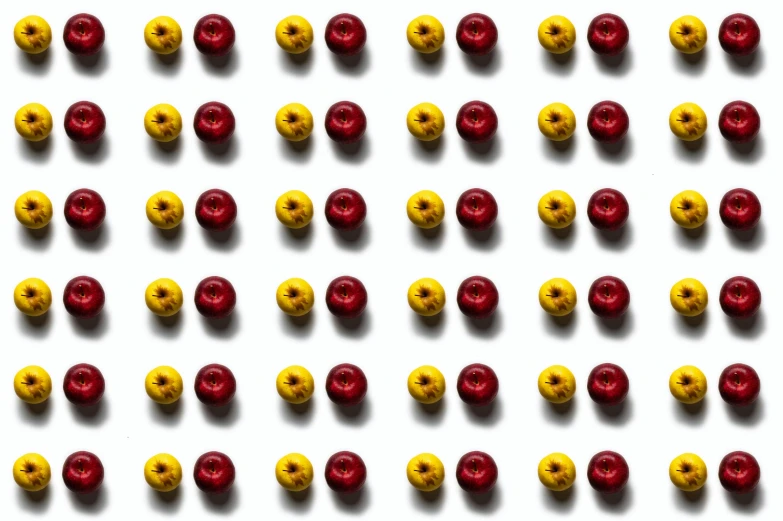 a lot of red and yellow balls on a white surface, by Gavin Hamilton, micro expressions, 2 colours, data, o pattern