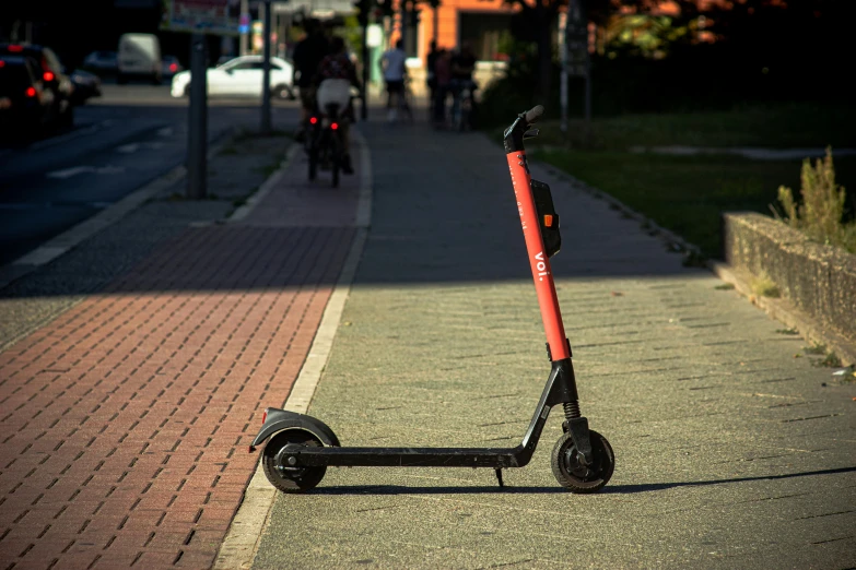 a scooter parked on the side of the road, by Niko Henrichon, unsplash contest winner, realism, red and obsidian neon, melbourne, 🦩🪐🐞👩🏻🦳, robotics