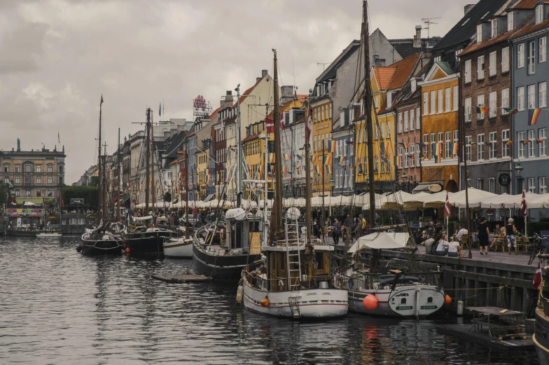 a number of boats in a body of water, by Jesper Knudsen, pexels contest winner, renaissance, in muted colors, a quaint, nordic, thumbnail
