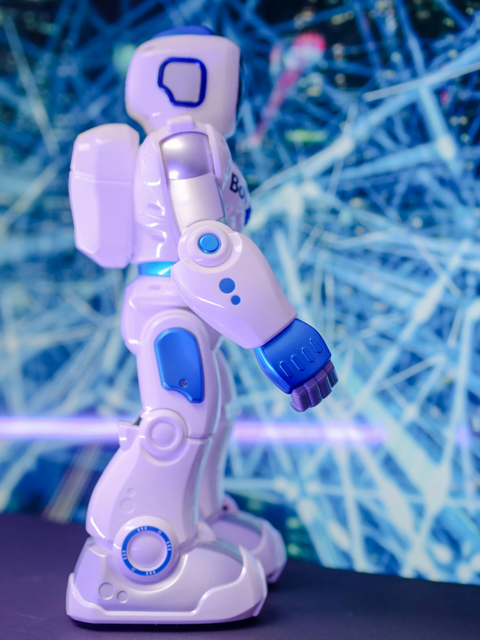 a close up of a toy robot on a table, a hologram, unsplash, けもの, siggraph, full body close-up shot, ((robot))