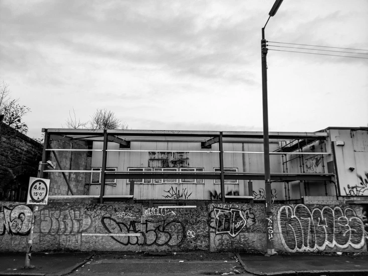 an abandoned building with graffiti all over it