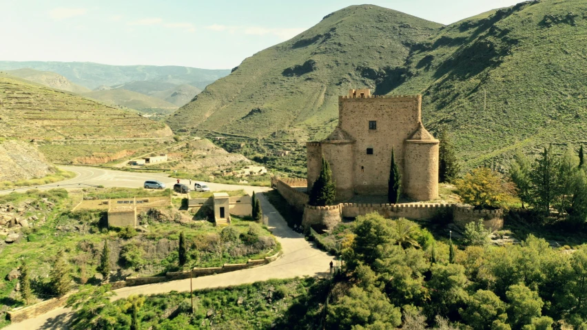 an old building in the middle of a mountains