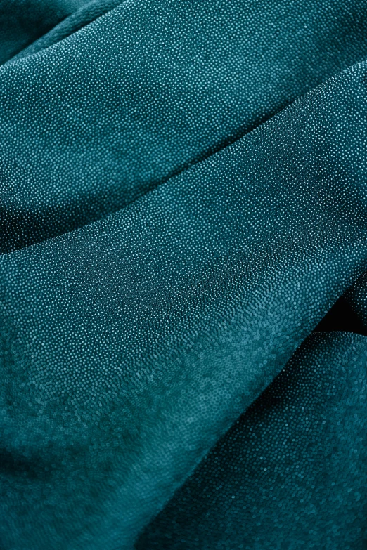 a close up of a teal colored fabric, by Adam Marczyński, renaissance, product shot, ((greenish blue tones)), made of fabric, chiffon