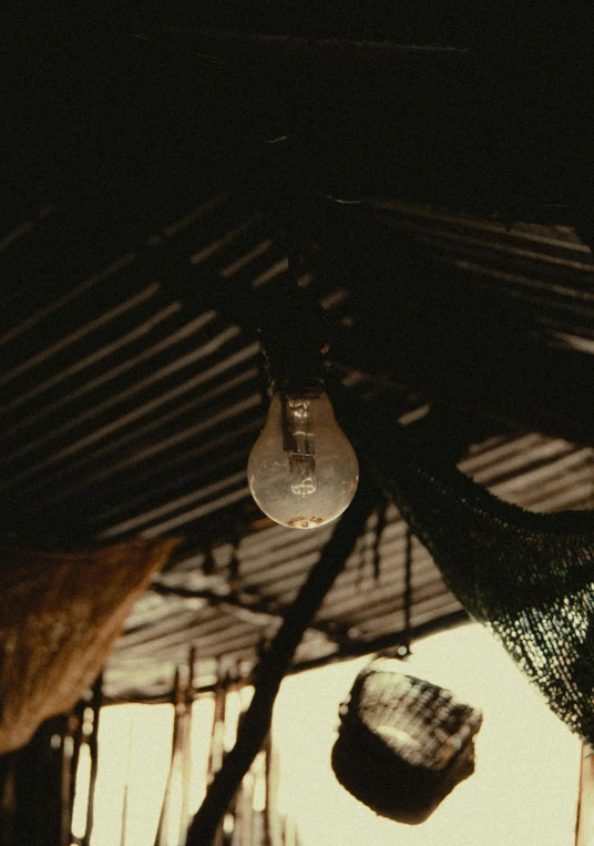 the top of a tent with sunlight coming in from it