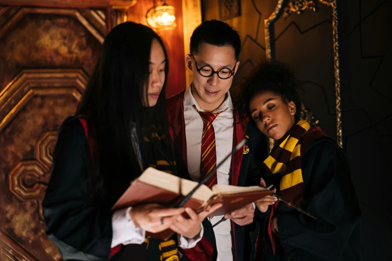 a couple of people that are looking at a book, inspired by Fuller Potter, trending on pexels, hurufiyya, wearing headmistress uniform, the harry potter trio (harry, an escape room in a small, louise zhang