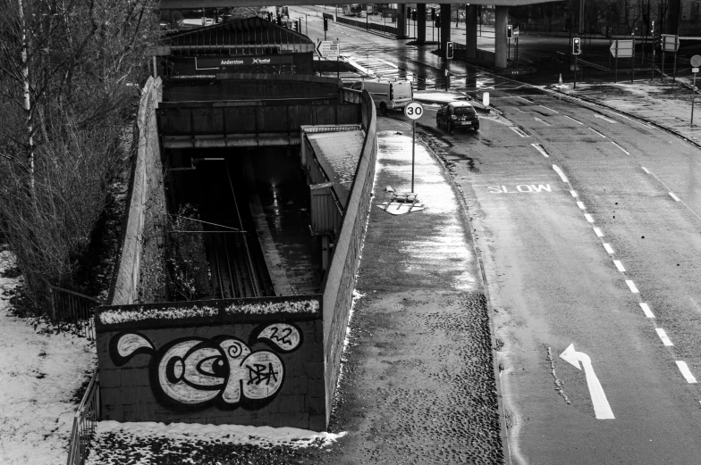 a bridge that has some graffiti on it