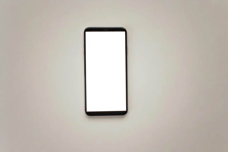 a cell phone sitting on top of a table, minimalism, 5000k white product lighting, whole body in frame, plain background, opaque glass