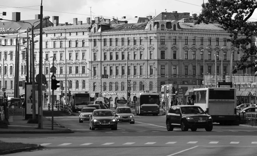 a black and white photo of a city street, by Emma Andijewska, pixabay, russian neoclassicism, car traffic, square, advertising photo