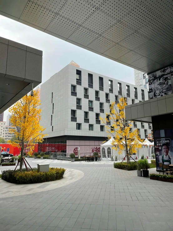 a large building with a courtyard next to it