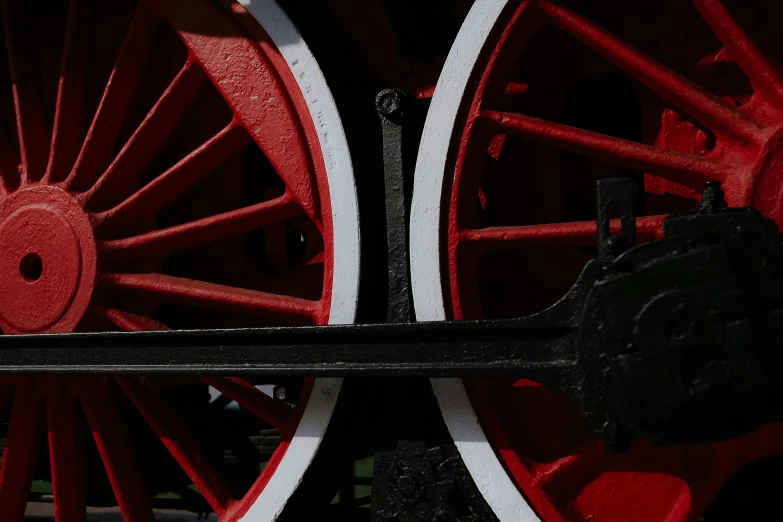 a close up of a red and white train wheel, by David Simpson, pexels contest winner, black-crimson color scheme, engines, museum photo, profile picture 1024px