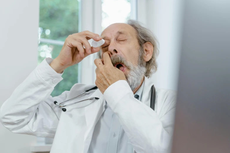 a man in a white lab coat brushing his teeth, a picture, pexels contest winner, hurufiyya, spitting cushions from his mouth, an oldman, professional image, wet eye in forehead