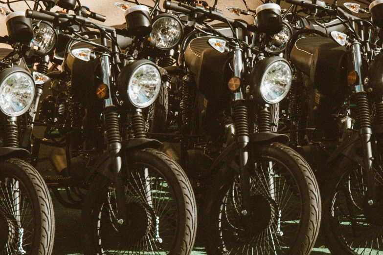 a group of motorcycles parked next to each other, pexels contest winner, avatar image, close up details, deus ex machina, black