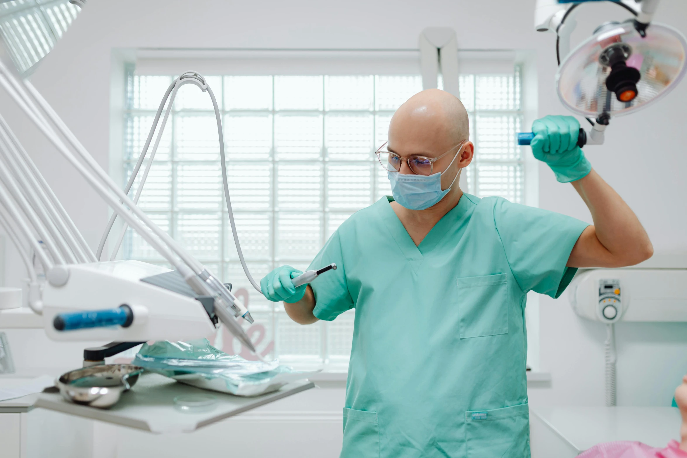 a man standing next to a woman in a dentist's chair, by Adam Marczyński, pexels contest winner, renaissance, glowing white lasers, on an operating table, youtube thumbnail, mr clean