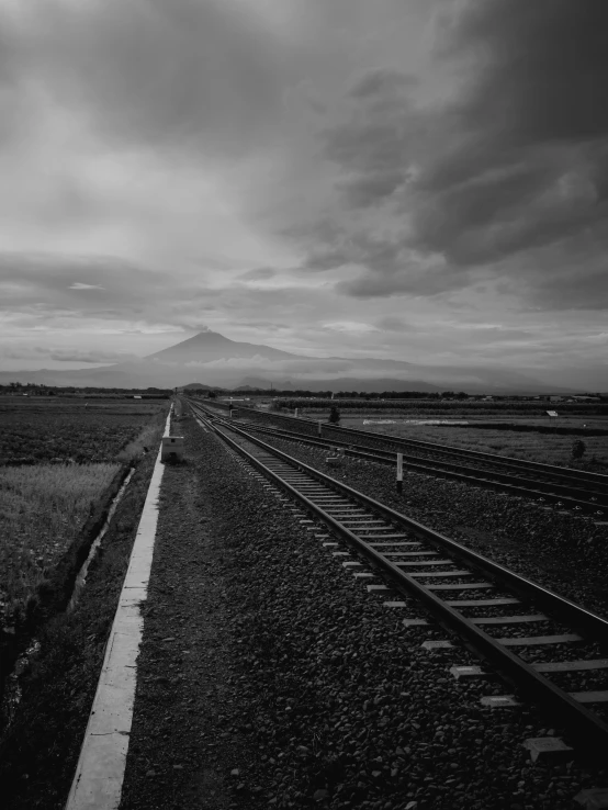 black and white pograph of a train track