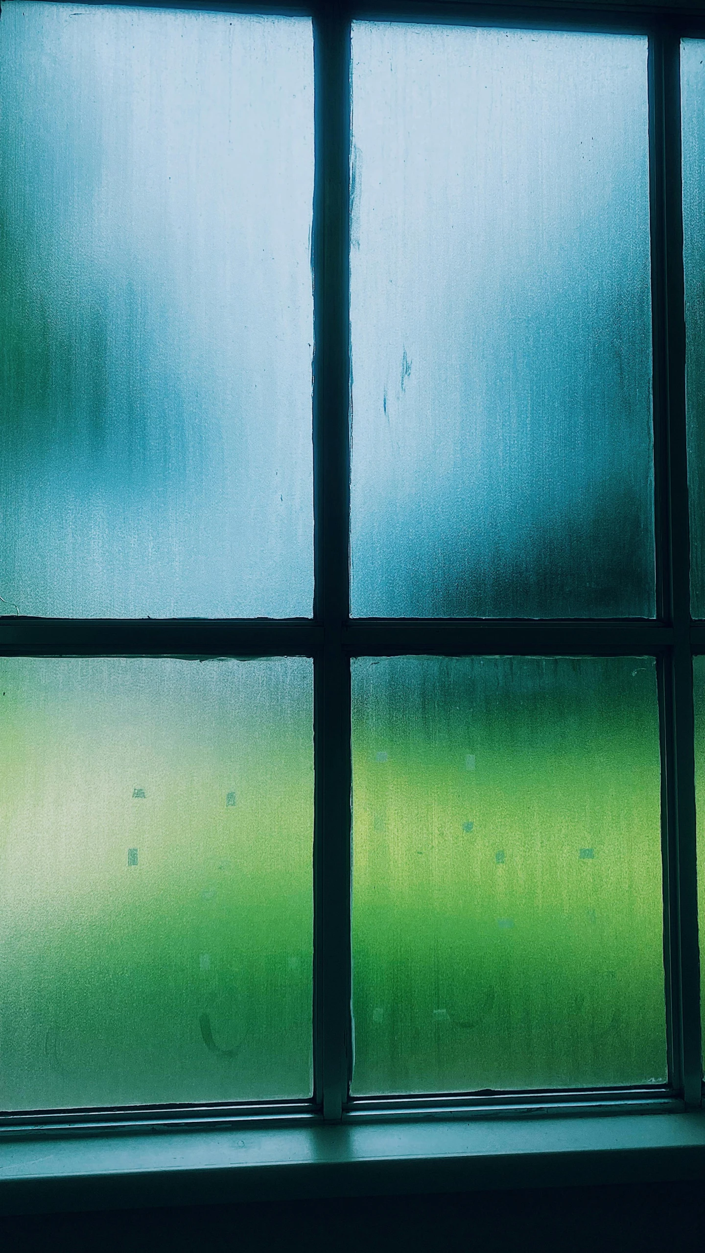 a close up of a window on a rainy day, an album cover, inspired by Elsa Bleda, pexels, modernism, gradient from green to black, medieval stained glass window, inside a shed, light green and deep blue mood