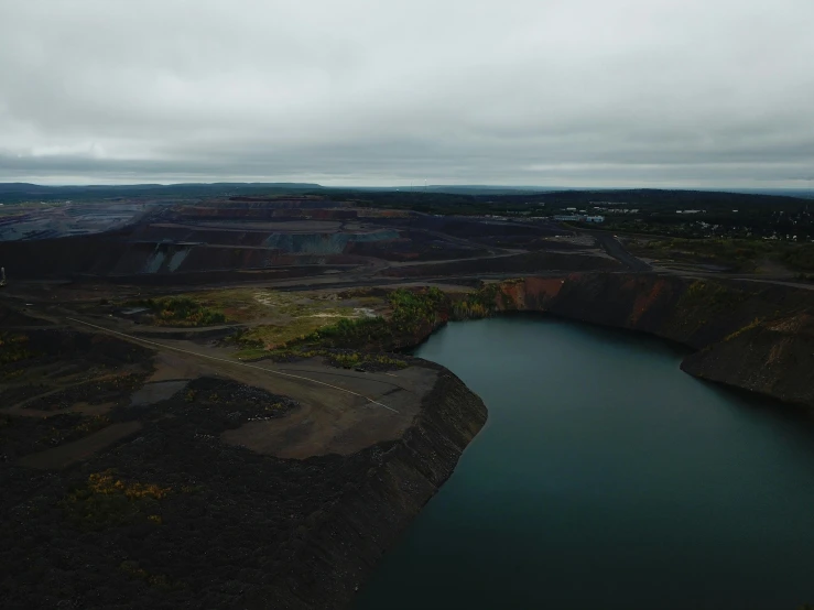 an aerial view of the land surrounding a river