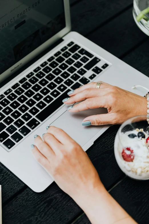 a close up of a person typing on a laptop, by Carey Morris, trending on pexels, holding a milkor mgl, ready to eat, avatar image, professional