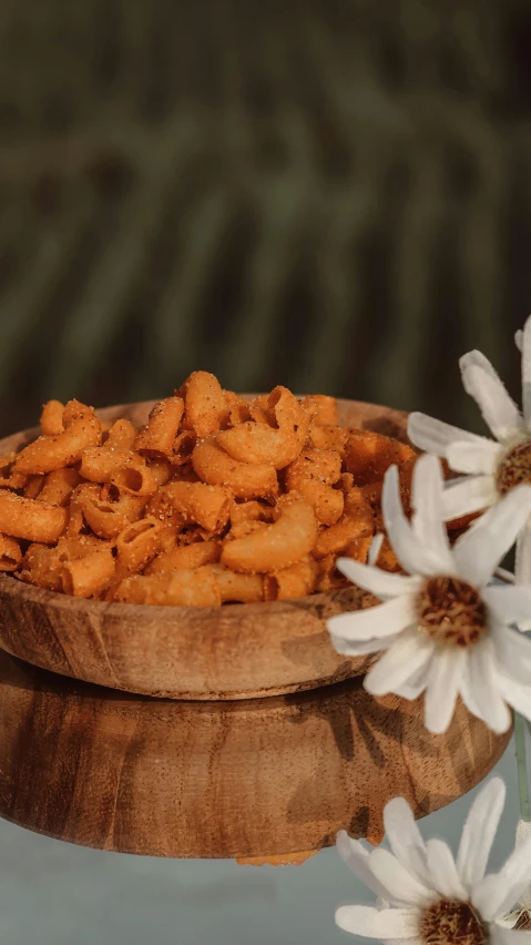 a close up of some food in a wooden bowl