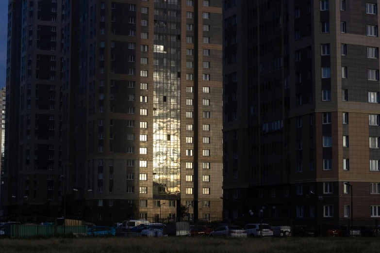 a tall building lit up from below