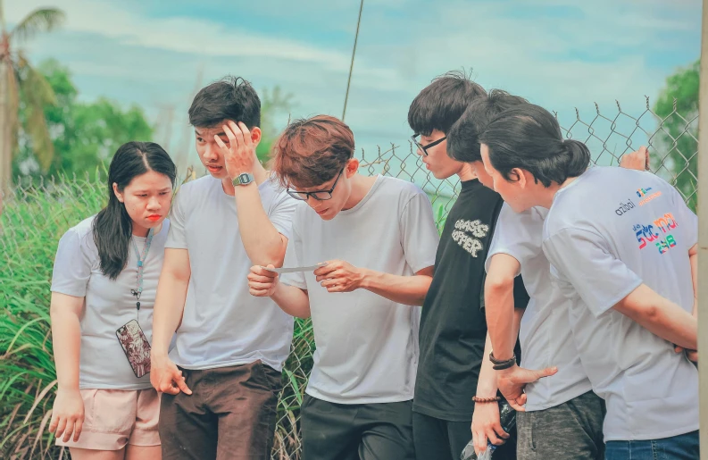 a group of people standing next to each other, by Jang Seung-eop, pexels contest winner, realism, 15081959 21121991 01012000 4k, summer day, concerned expression, maintenance photo