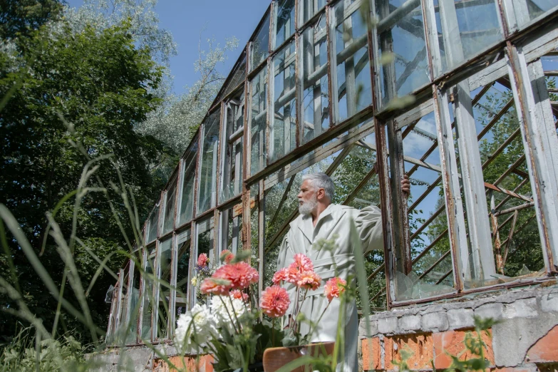 a man standing in front of a greenhouse, terry gilliam, profile image, lpoty, apollinaris vasnetsov
