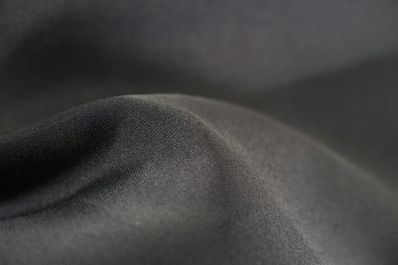 closeup of black fabric fabric with thin lines