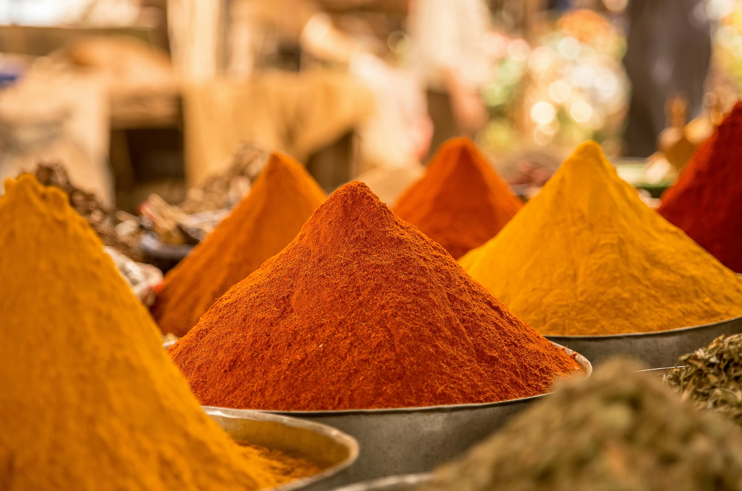 a bunch of bowls filled with different colored spices, inspired by Steve McCurry, trending on unsplash, vibrant orange, thumbnail, inside an arabian market bazaar, avatar image