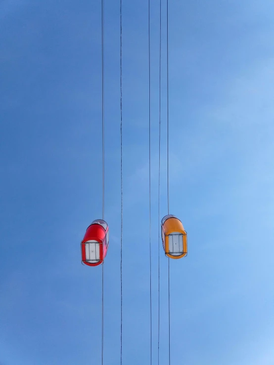 an image of several street lights in the sky