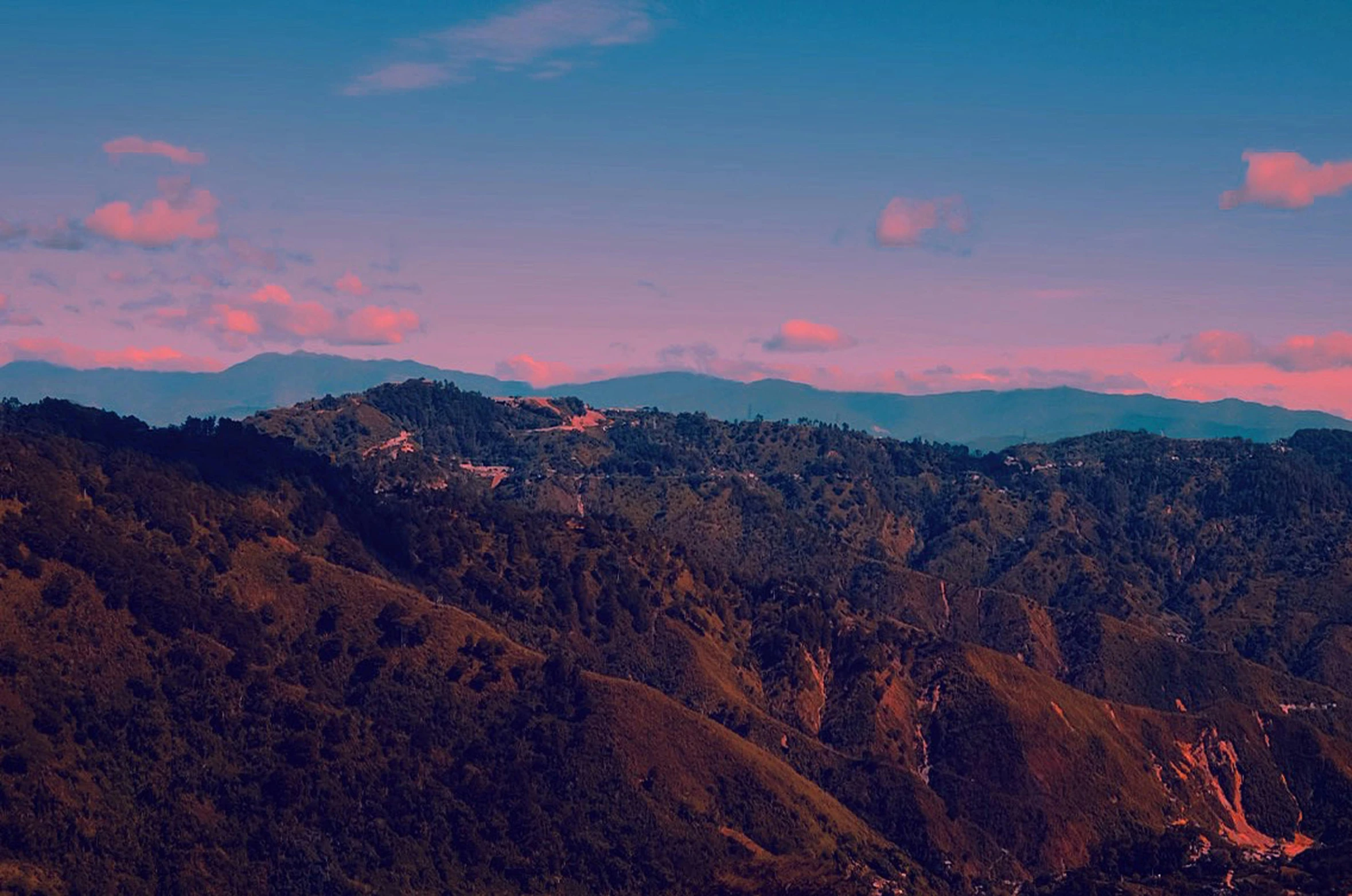 a view of the mountains from the top of a hill, an album cover, by Alejandro Obregón, pexels contest winner, sumatraism, blue and pink colors, los angeles 2 0 1 5, instagram post, background image