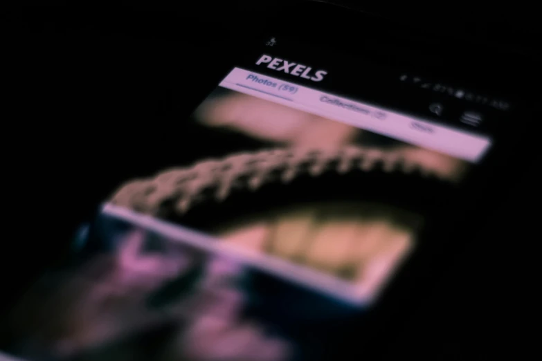 a close up of a person holding a cell phone, trending on pexels, pixel art, dark feeling, faceted, photo taken on a nikon, pc screen image