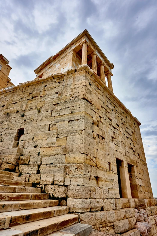 a stone building with steps leading up to it, inspired by Theophanes the Greek, unsplash, athena, square, view from ground, mausoleum