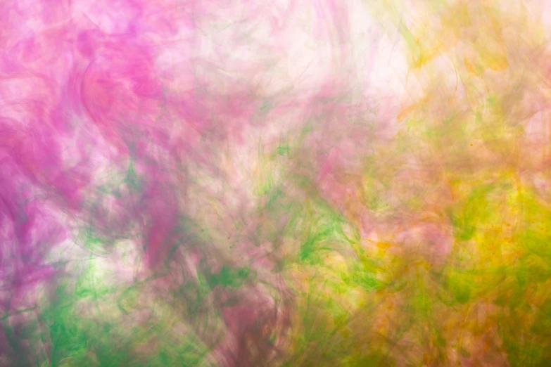 a blurry photo of a tree with pink and green leaves, an album cover, inspired by Anna Füssli, pexels, abstract expressionism, rainbow smoke, yellow purple green, abstract painting. 8k, marbling