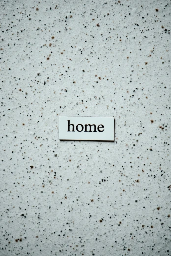 a white sign with the word home on it, an album cover, flickr, terrazzo, philosophy, hd picture, mundane