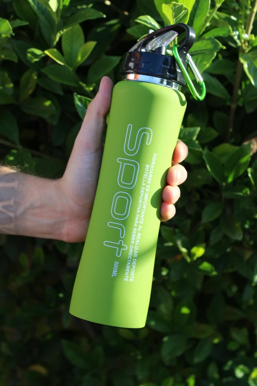 a person holding a water bottle in their hand, inspired by Tom Scott RSA, light green, super close up shot, engraved, neoprene