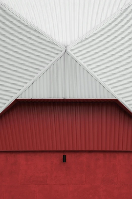 a red and white building with a white roof, a picture, inspired by Andreas Gursky, pexels contest winner, postminimalism, polygonal iron steel walls, barn, 3 colours, silver red