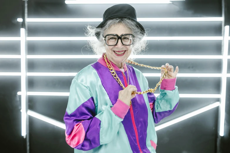 a woman standing in front of a neon light, trending on pexels, neo-dada, dressed as a judge's robes, elderly woman, wearing a track suit, wearing a chain