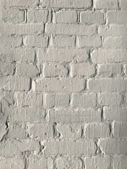 an image of a brick wall painted white