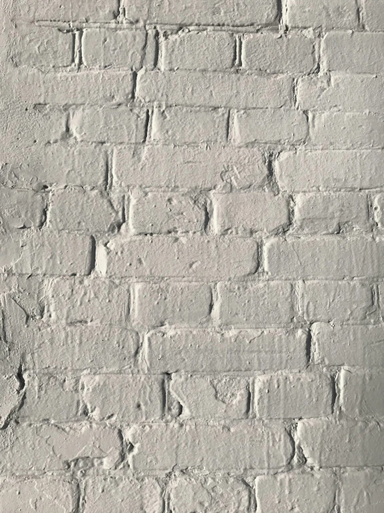 an image of a brick wall painted white