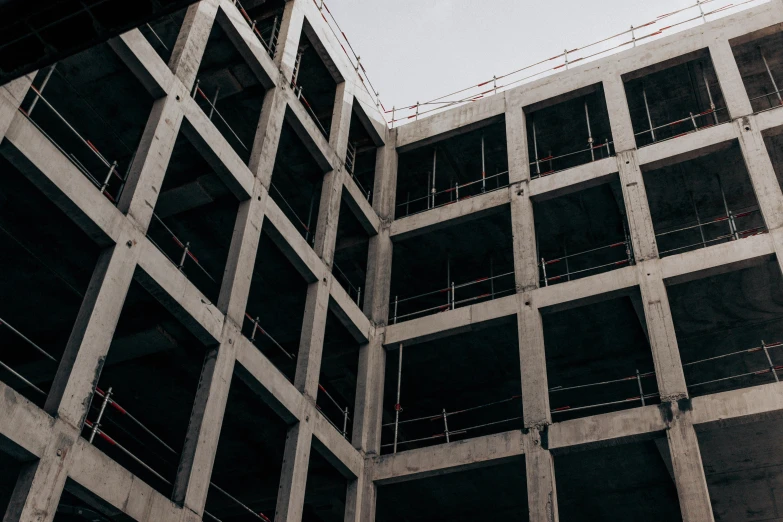 a black and white photo of a building under construction, a photo, unsplash, brutalism, thumbnail, colour corrected, inspect in inventory image, concrete housing