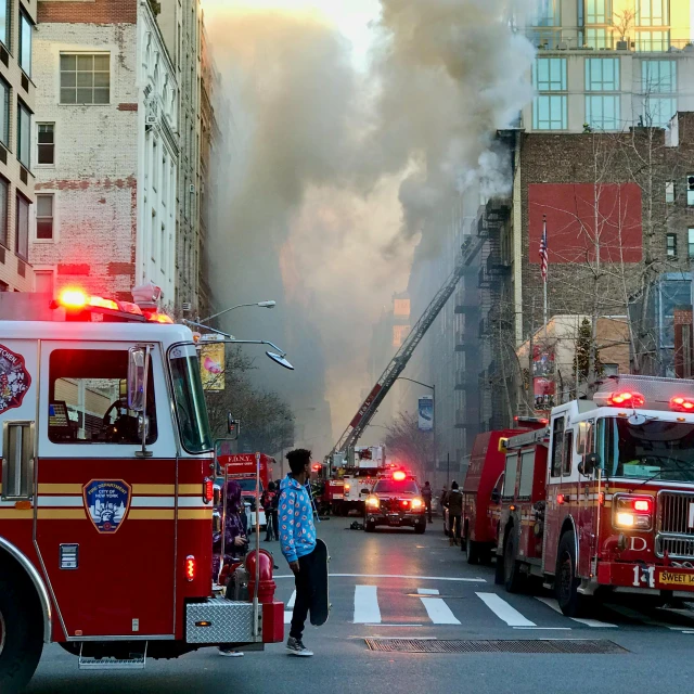 a bunch of fire trucks that are in the street, a photo, by Douglas Shuler, pexels contest winner, renaissance, rundown new york apartment, building on fire, slide show, afp