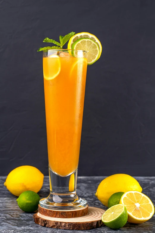 a tall glass filled with orange juice next to lemons, reddit, on a gray background, mint, scorpion tail, thumbnail